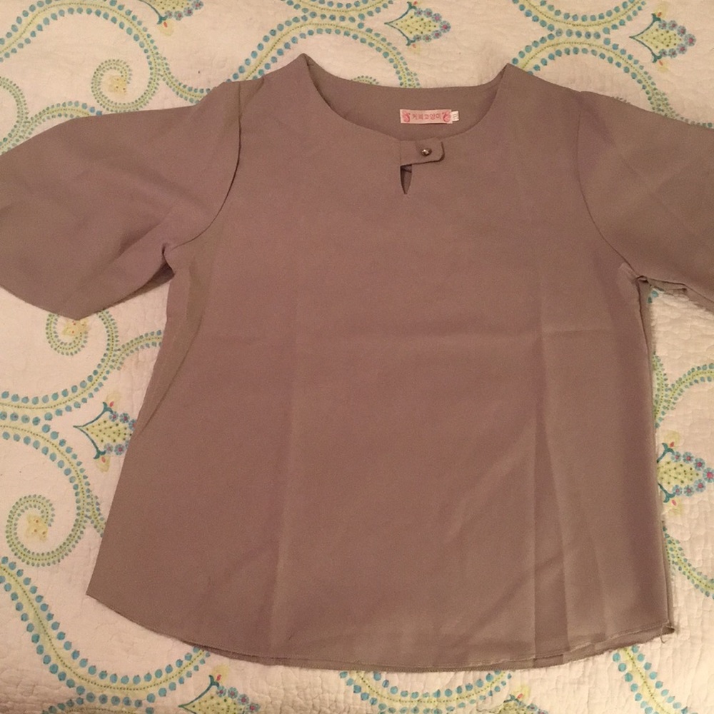 Grey flutter sleeve blouse marked 2x but really 12